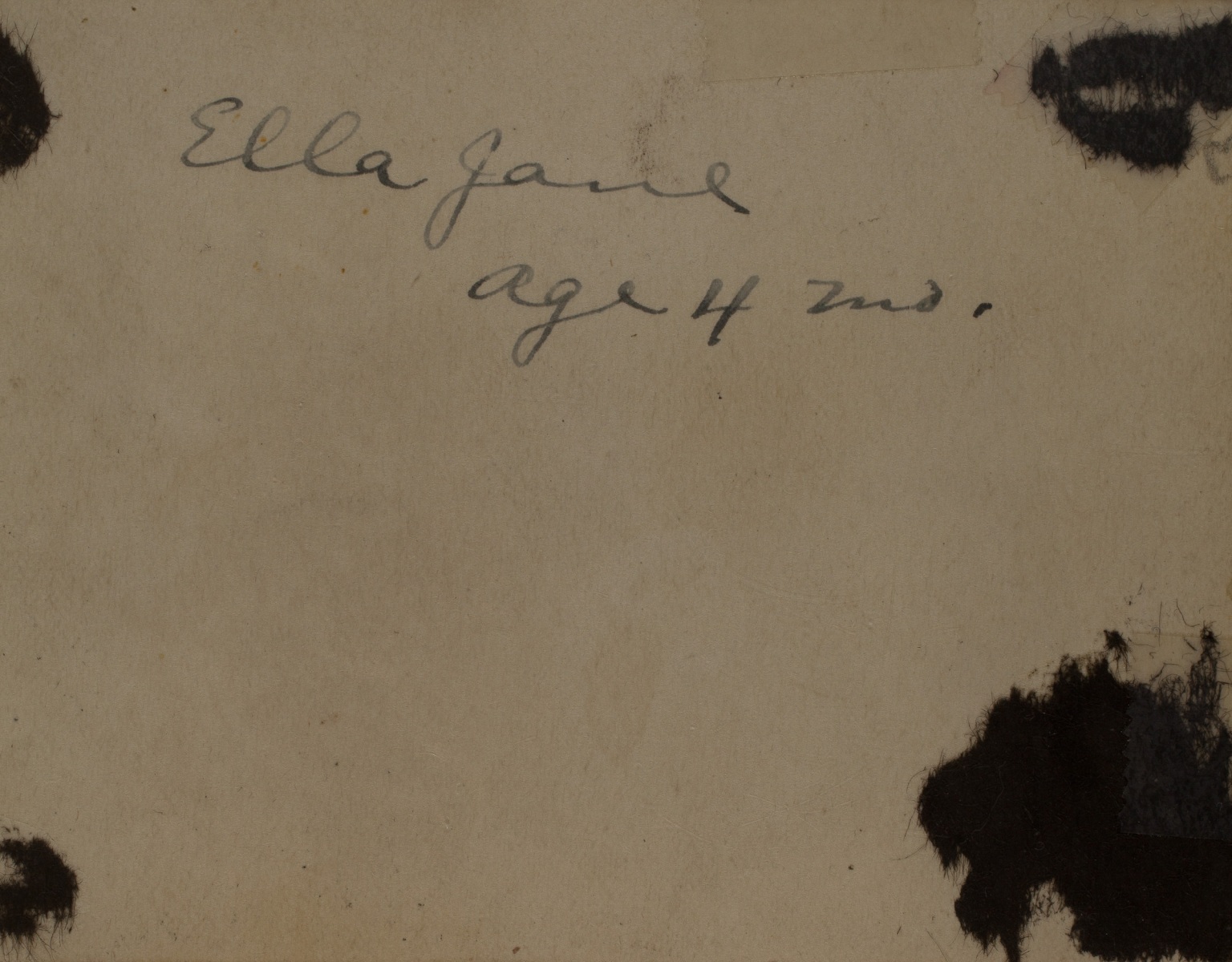 1919  back of photo of Ella Jane held by Ellenor Bonney  "Ella Jane age 4 mo."